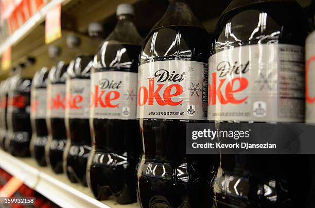 Soft drinks are displayed on the shelf of a local market on January 23, 2013 in Los Angeles, California. According to reports, carbonated soft drink...