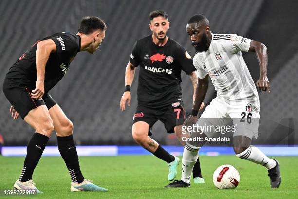 Can Keles of Vavacars Fatih Karagumruk in action against Arthur Masuaku of Besiktas during Turkish Super Lig week 1 match between Vavacars Fatih...