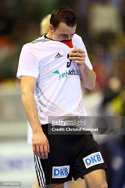 Dominik Klein of Germany looks dejected after losing 24-28 the quarterfinal match between Spain and Germany at Pabellon Principe Felipe Arena on...