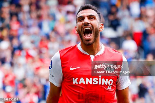 Vangelis Pavlidis of AZ Alkmaar scores the 2-0 and celebrating his goal with teammates during the Dutch Eredivisie match between AZ Alkmaar and Go...