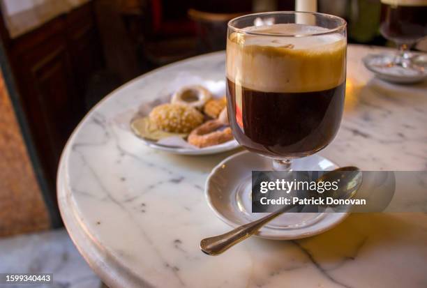 bicerin and cookies in a cafe, turin, italy - turin stock pictures, royalty-free photos & images