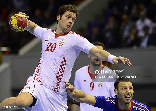 Croatia's left back Damir Bicanic vies with France's left wing Jerome Fernandez during the 23rd Men's Handball World Championships quarterfinal match...