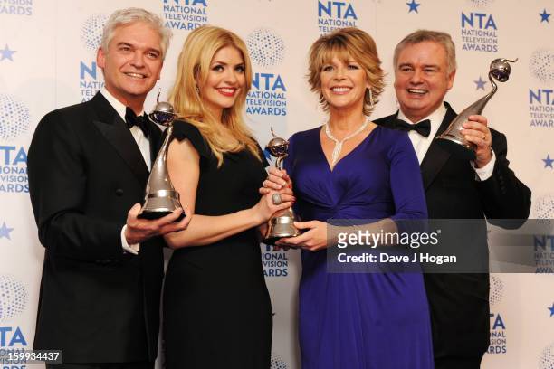 Holly Willoughby, Phillip Schofield, Ruth Langsford and Eamon Holmes pose with the Best Daytime TV Award for 'This Morning' in front of the winners...