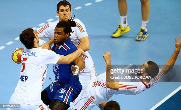 France's pivot Cedric Sorhaindo vies with Croatia's centre back Domagoj Duvnjak , Croatia's left back Jakov Gojun, Croatia's pivot Zeljko Musa and...