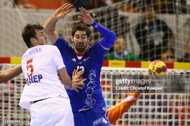 Nikola Karabatic of France defends against Domagoj Duvnjak of Croatia during the quarterfinal match between France and Croatia at Pabellon Principe...