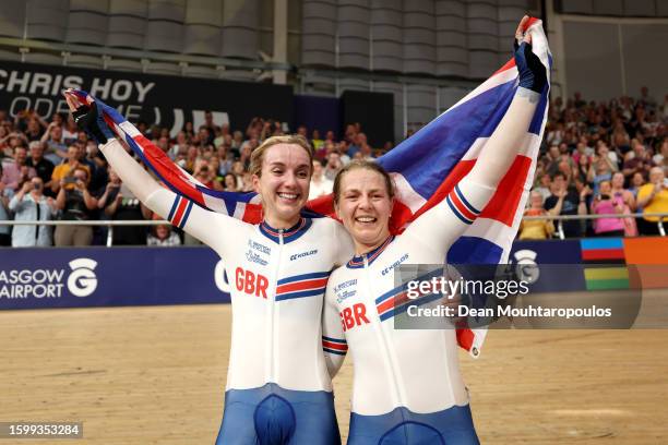 Gold medalists Neah Evans and Elinor Barker of Team Great Britain celebrate after winning the Women's Elite Track Madison at the 96th UCI Glasgow...