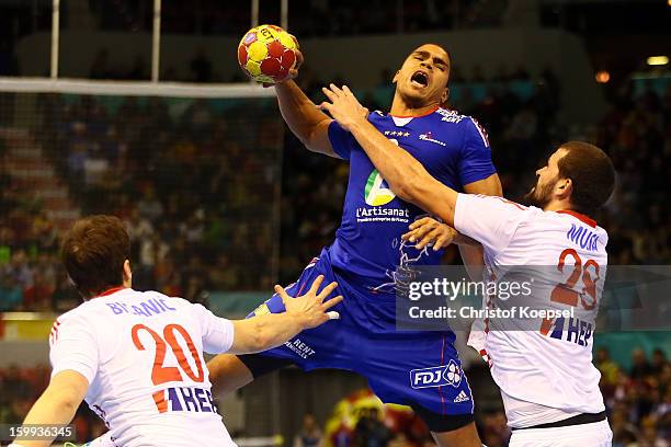 Damir Bicanic of Croatia and Zeljko Musa of Croatia defend against Daniel Narcisse of France during the quarterfinal match between France and Croatia...