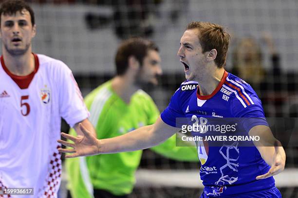 France's right wing Valentin Porte celebrates after scoring during the 23rd Men's Handball World Championships quarterfinal match France vs Croatia...