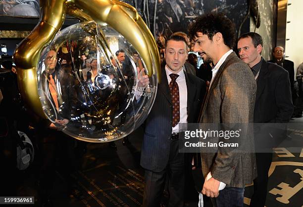 Jean-Marc Pontroue , CEO of Roger Dubuis and friend of the brand, Tomer Sisley admire the Excalibur Quatuor watch in the booth during the 23rd Salon...