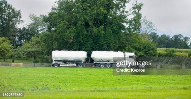 vehicle tanker truck - fuel truck stock pictures, royalty-free photos & images