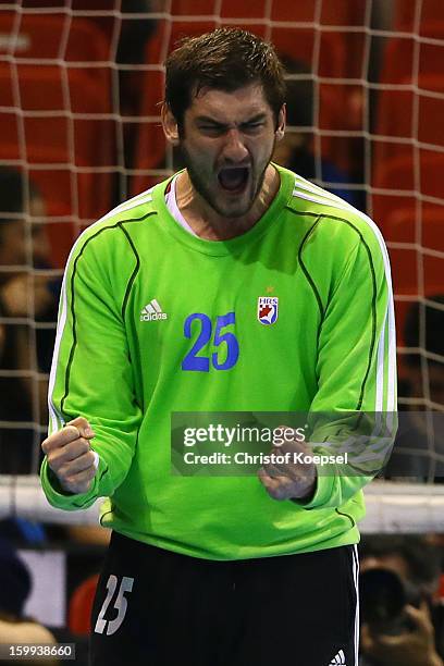 Mirko Alilovic of Croatia celebrates saving a seven meter shot during the quarterfinal match between France and Croatia at Pabellon Principe Felipe...