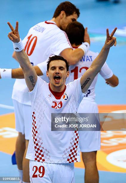 Croatia's Ivan Ninecevic celebrates at the end of the 23rd Men's Handball World Championships quarterfinal match France vs Croatia at the Pabellon...