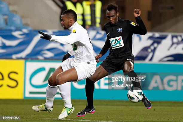 Brest's French defender Johan Martial vies with CAB's forward Alassane N'Diaye during the French football Cup match CA Bastia vs Brest at the Armand...