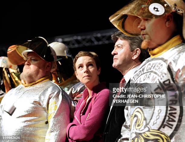 French far-left activist Clementine Autain and French far-left Parti de Gauche party's leaders Jean-Luc Melenchon stand beside ArcerlorMittal...
