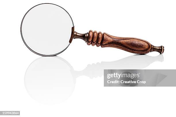 magnifying glass / spyglass - lente d'ingrandimento foto e immagini stock