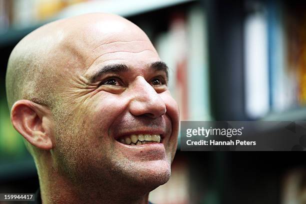Andre Agassi signs copies of his autobiography, Open, at Paper Plus Newmarket on January 24, 2013 in Auckland, New Zealand.