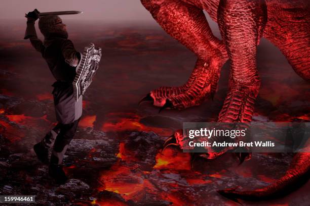 boy dressed as a knight fights a dragon - gambling stock pictures, royalty-free photos & images