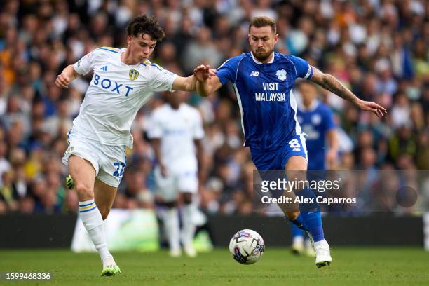 Archie Gray of Leeds United and Joe Ralls of Cardiff City fight for the ball during the Sky Bet Championship match between Leeds United and Cardiff...