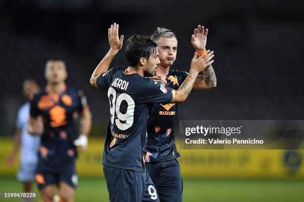 Ivan Ilic of Torino FC celebrates a goal with team mate Simone Verdi during the Coppa Italia Round of 32 match between Torino FC and Feralpisalo at...