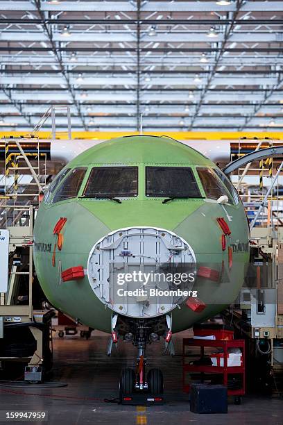 An ATR 72 turboprop aircraft, manufactured by Avions de Transport Regional , stands under construction at the company's production facility in...