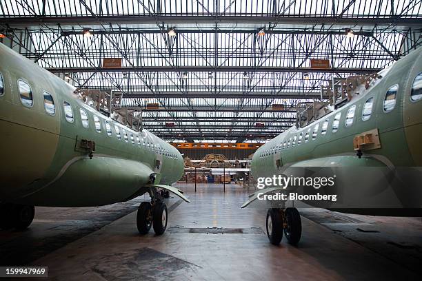 Turboprop aircraft, manufactured by Avions de Transport Regional , stand at the company's production facility in Colomiers, France, on Wednesday,...