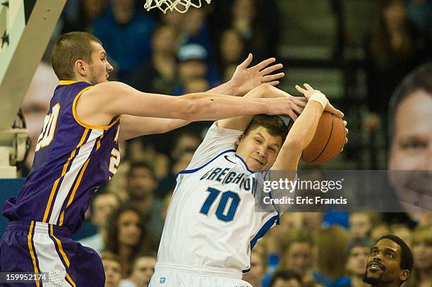 Grant Gibbs of the Creighton Bluejays battles for a rebound with Jake Koch of the Northern Iowa Panthers during their game at the CenturyLink Center...