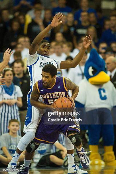 Jahenns Manigat of the Creighton Bluejays guards Anthony James of the Northern Iowa Panthers during a game at the CenturyLink Center on January 15,...