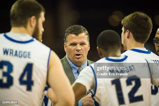 Head coach Greg McDermott of the Creighton Bluejays talks to his team during a time out in the game against the Northern Iowa Panthers at the...