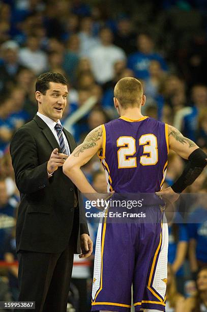 Marc Sonnen of the Northern Iowa Panthers listens to head coach Ben Jacobson during their game at the CenturyLink Center on January 15, 2013 in...