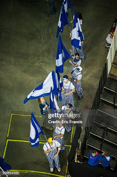 The Creighton Bluejay flag bearers wait to lead the team to the floor against the Northern Iowa Panthers at the CenturyLink Center on January 15,...