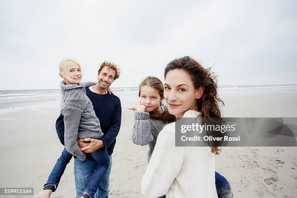 happy family on the beach - family with two children bildbanksfoton och bilder