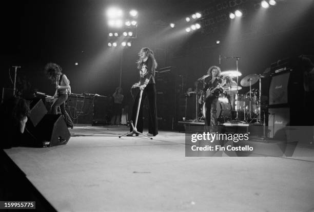 1st NOVEMBER: English rock group Deep Purple perform live on stage during the band's American tour in November 1974. Left to right: bassist Glenn...