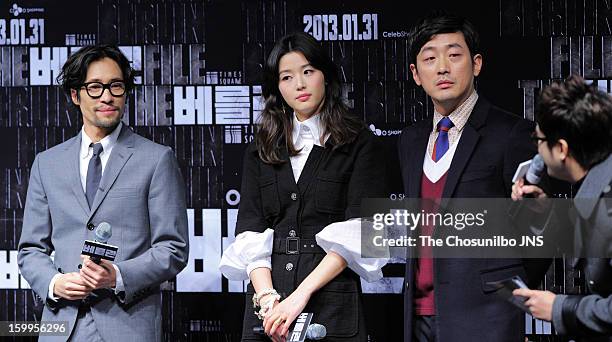 Ryoo Seung-Bum, Jeon Ji-Hyun and Ha Jung-Woo attend the 'The Berlin File' Red Carpet & Vip Press Screening at Times Square on January 23, 2013 in...