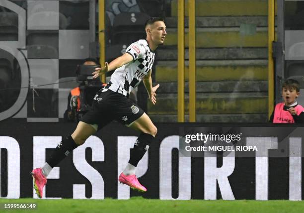 Boavista's Slovak forward Robert Bozenik celebrates after scoring a goal during the Portuguese Liga football match between Boavista FC and SL Benfica...