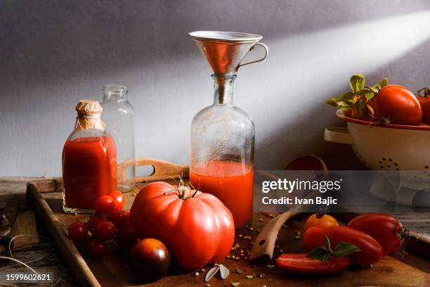 making tomato juice - canning stock pictures, royalty-free photos & images