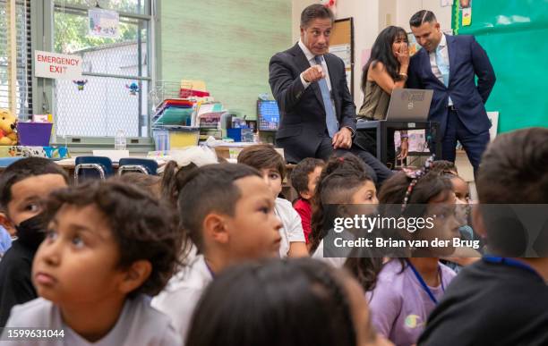 Valley Glen, CA Los Angeles Unified School District Superintendent Alberto Carvalho, left, gestures during a visit with first graders at Coldwater...