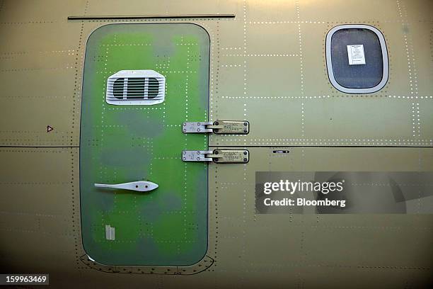 Newly-fitted door sits on the fuselage of an ATR-72 turboprop aircraft, manufactured by Avions de Transport Regional , during assembly at the...