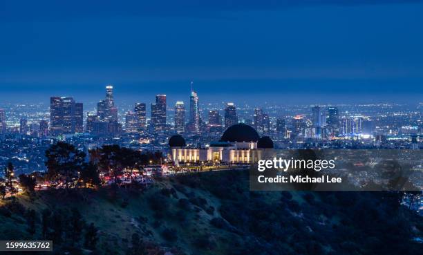 twilight view of griffith observatory and downtown los angeles - observatory stock pictures, royalty-free photos & images
