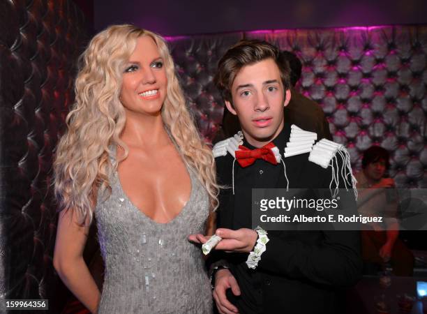Actor Jimmy Bennett poses with a wax figure of singer Britney Spears as he attends Relativity Media's "Movie 43" Los Angeles Premiere After Party...
