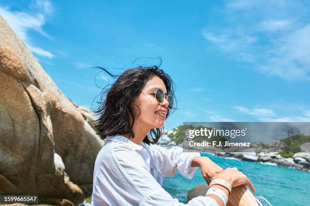 portrait of woman on the beach - magdalena department colombia stock pictures, royalty-free photos & images