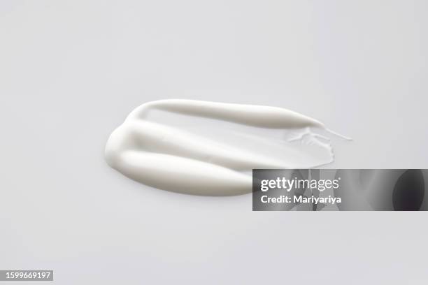 texture of white cream on a white background. - cream coloured stock pictures, royalty-free photos & images