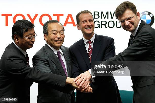 Yasumori Ihara, director and senior managing officer at Toyota Motor Corp., from left, Takeshi Uchiyamada, vice chairman of Toyota Motor Corp.,...