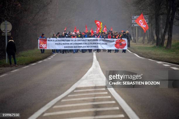 Workers of the Fessenheim nuclear plant demonstrate on January 24, 2013 in Fessenheim, eastern France to protest against French government's decision...