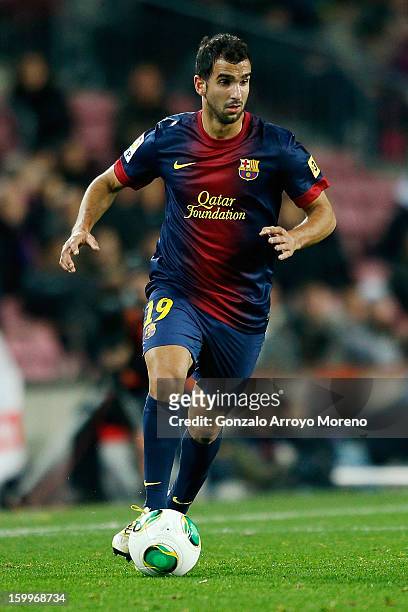 Martin Montoya of Barcelona FC runs with the ball during the Copa del Rey Quarter Final match between Barcelona FC and Malaga CF at Camp Nou on...