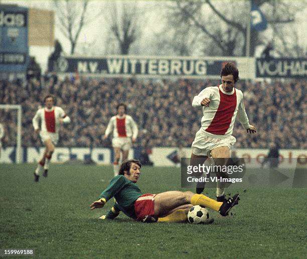 Aad Mansveld of FC Den Haag , Johan Cruijff of Ajax during the match between FC Den Haag and Ajax Amsterdam on January 2, 1972 at The Hague,...