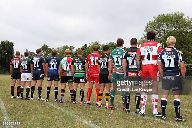 The captains of the 12 Aviva Premiership clubs pose with their backs to camera during the Aviva Premiership Season Launch 2012-2013 at Twickenham...