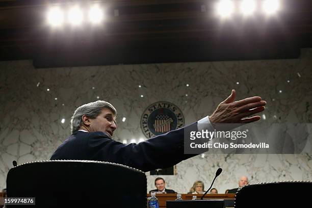 Sen. John Kerry gives an opening statement during his confirmation hearing before the Senate Foreign Relations Committee to become the next Secretary...