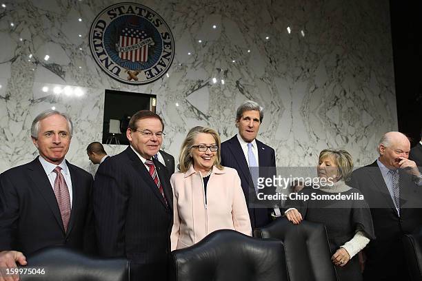 Senate Foreign Relations Committee ranking member Sen. Bob Corker , Chairman Sen. Robert Menendez , U.S. Secretary of State Hillary Clinton, Sen....