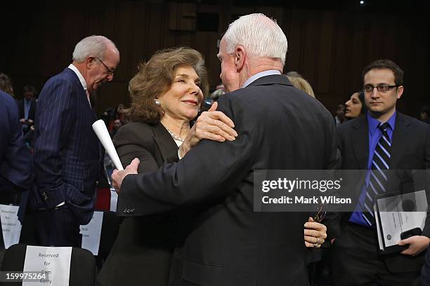 Teresa Heinz Kerry , wife of Sen. John Kerry , embraces Sen. John McCain during Sen. Kerry's confirmation hearing before the Senate Foreign Relations...