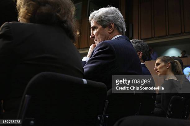 Sen. John Kerry listens as he is introduced at his confirmation hearing before the Senate Foreign Relations Committee to become the next Secretary of...